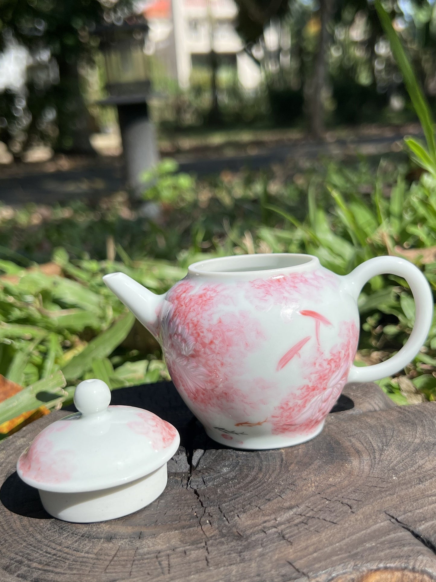 this is Chinese Jingdezhen famille rose teapot.this is a ceramic lotus teapot