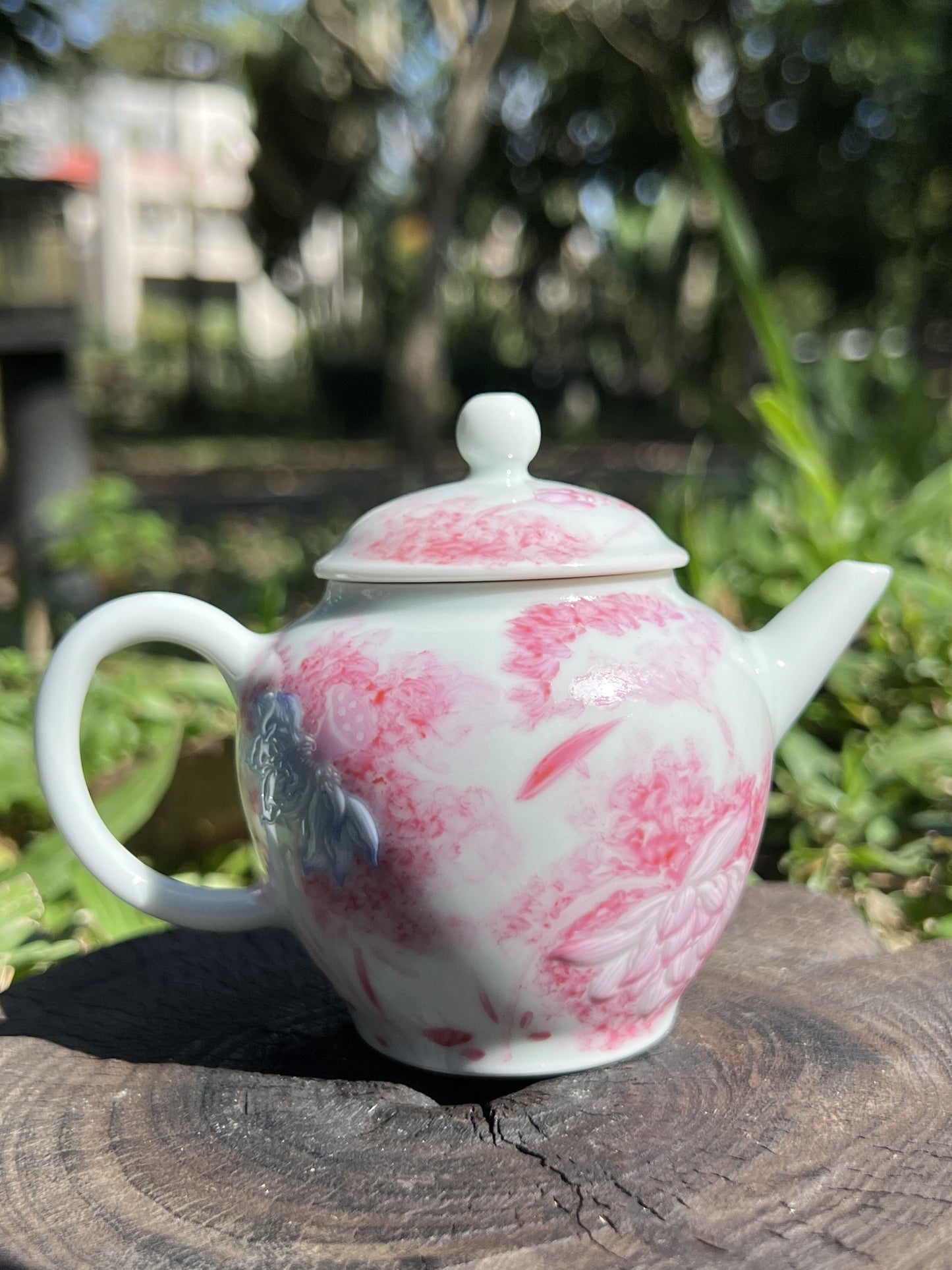 this is Chinese Jingdezhen famille rose teapot.this is a ceramic lotus teapot