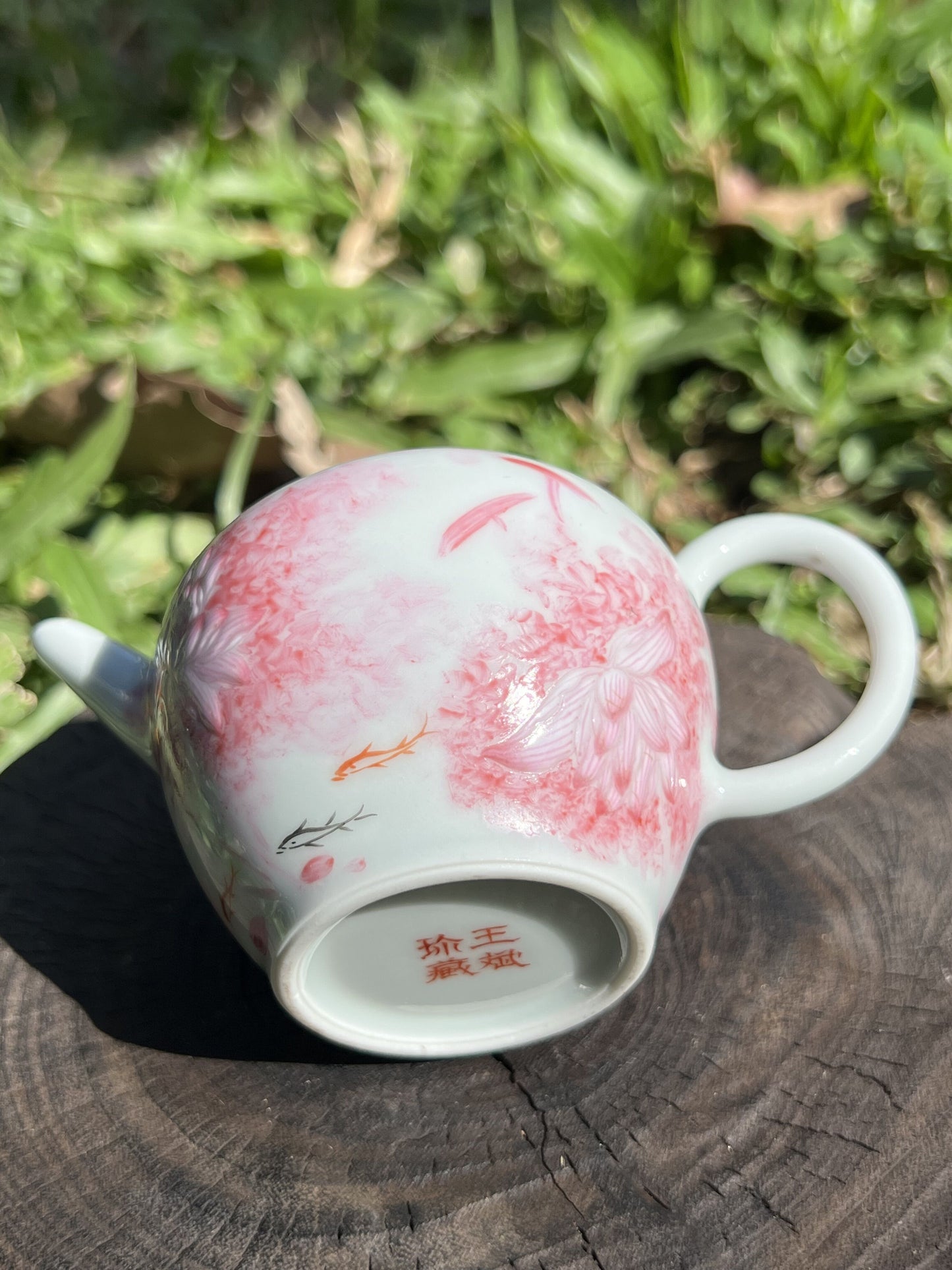 this is Chinese Jingdezhen famille rose teapot.this is a ceramic lotus teapot