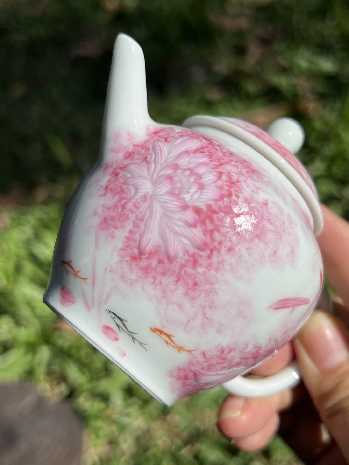 this is Chinese Jingdezhen famille rose teapot.this is a ceramic lotus teapot