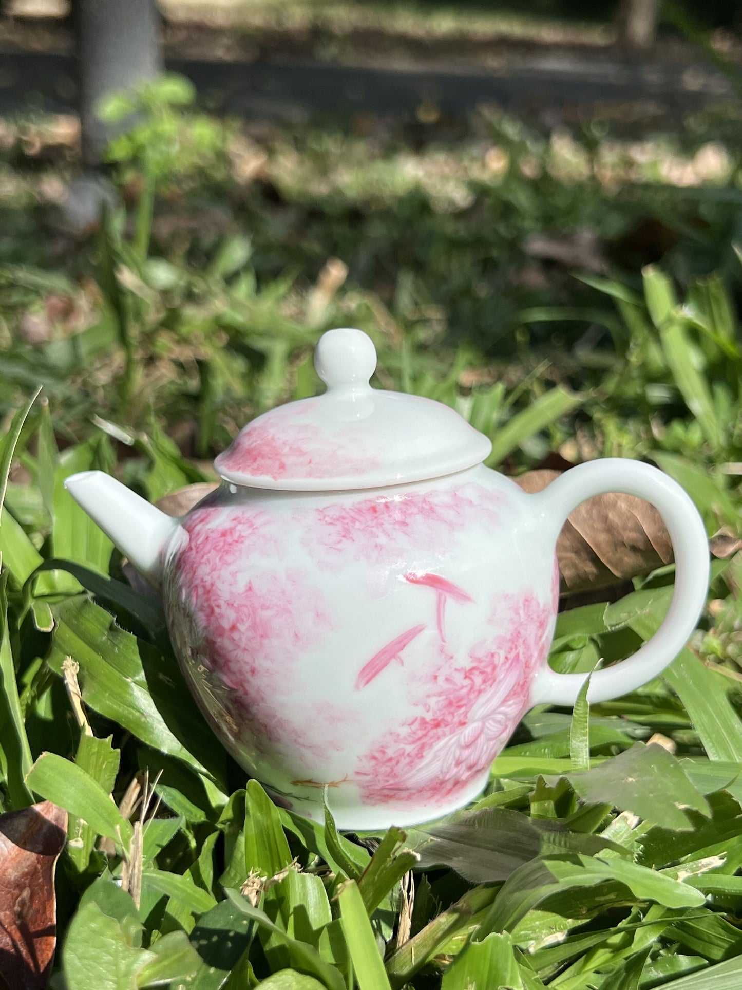 this is Chinese Jingdezhen famille rose teapot.this is a ceramic lotus teapot