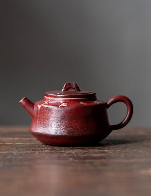 This is a pottery teapot