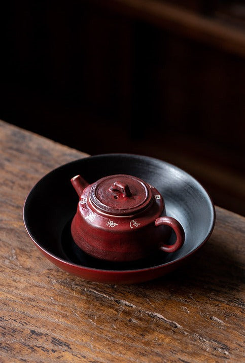This is a pottery teapot