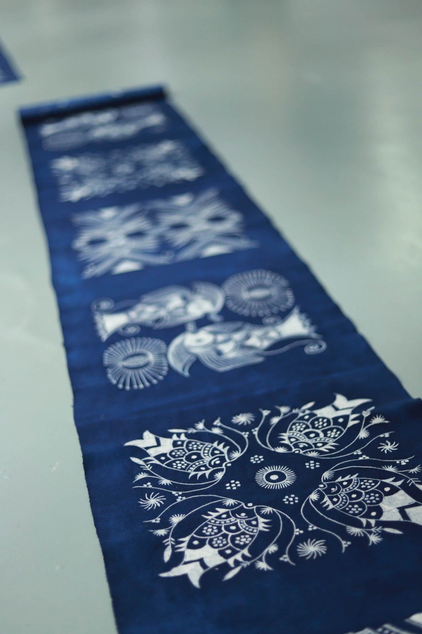 This is a Chinese Miao style batik table cloth tea mat