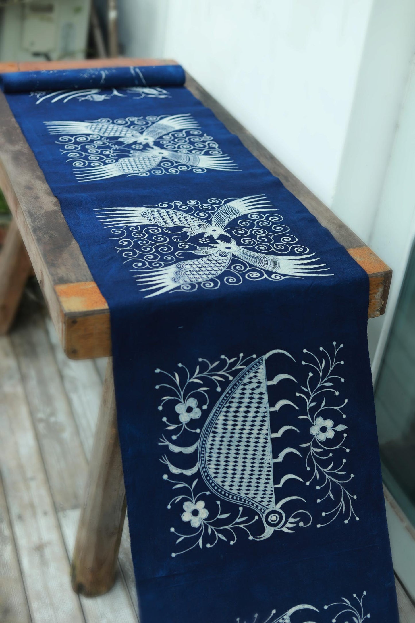This is a Chinese Miao style batik table cloth tea mat