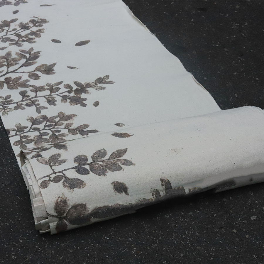 This is a plant-dyed tea mat table cloth