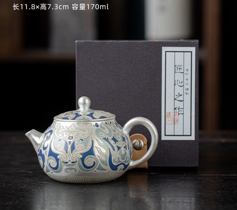 This is a gilded silver teapot. This is a ceramic teapot