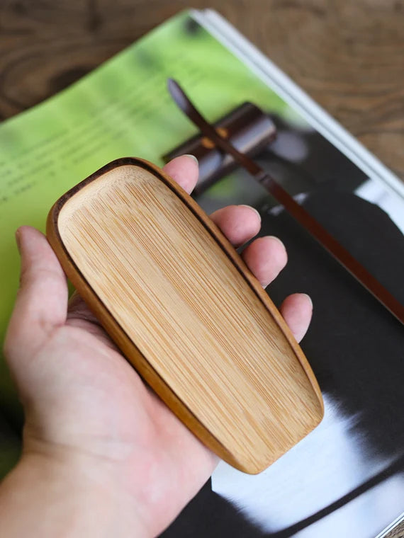 This is a bamboo tea scoop
