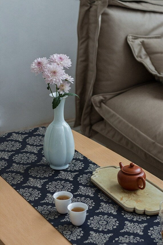 This is a celadon ceramic vase flower arrangement vessel