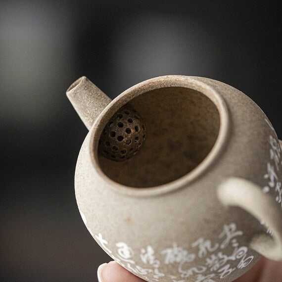 This is a pottery teapot