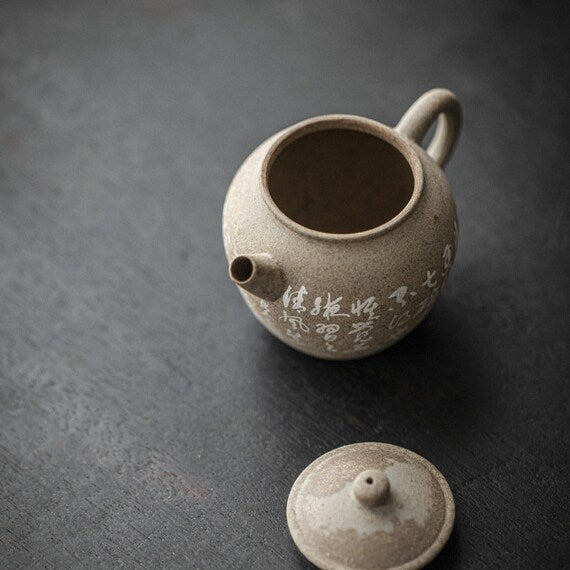 This is a pottery teapot