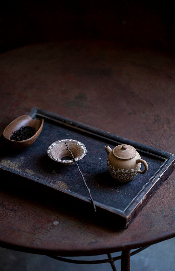 This is a pottery teapot