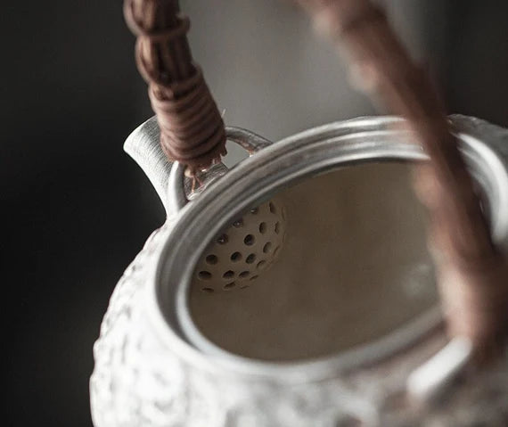 This is a gilted silver kettle