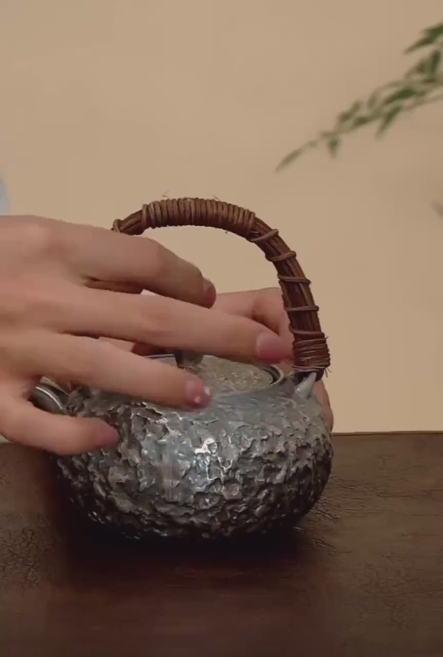 This is a gilted silver kettle