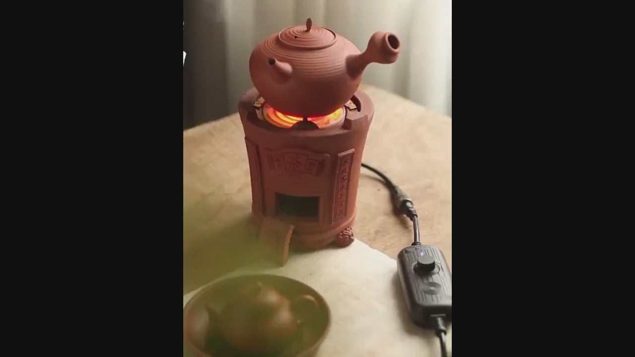 This is a pottery electric This is an electric charcoal stove. this is a chaozhou clay pottery stove