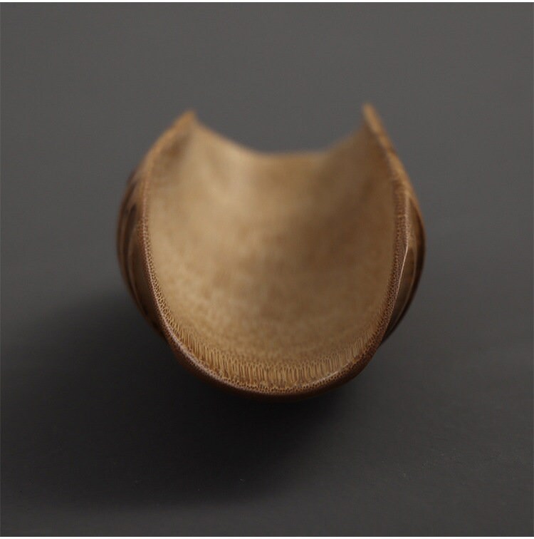 This is a bamboo root tea scoop