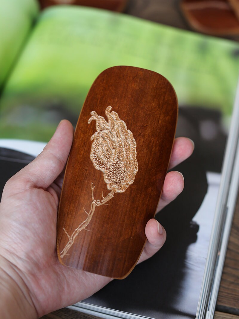 This is a bamboo tea scoop