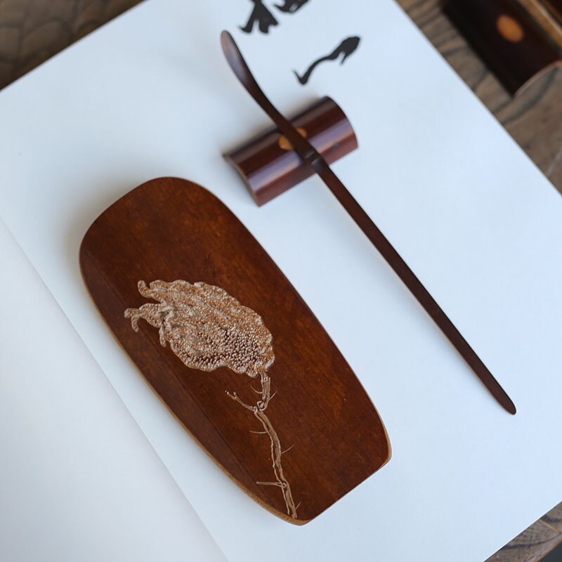 This is a bamboo tea scoop