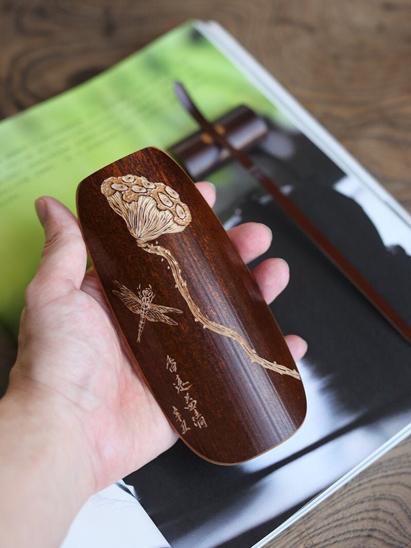 This is a bamboo tea scoop
