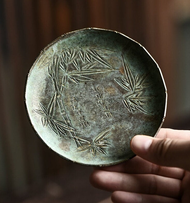 this is a copper teacup tray