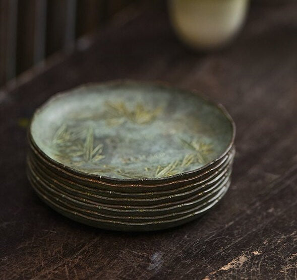 this is a copper teacup tray