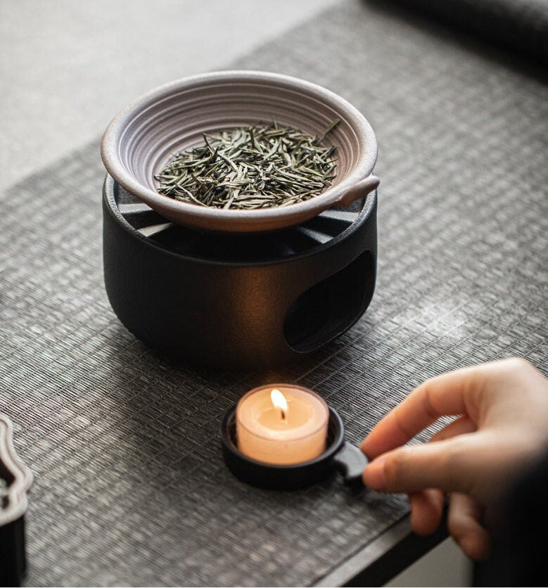 This is a pottery scoop warmer set