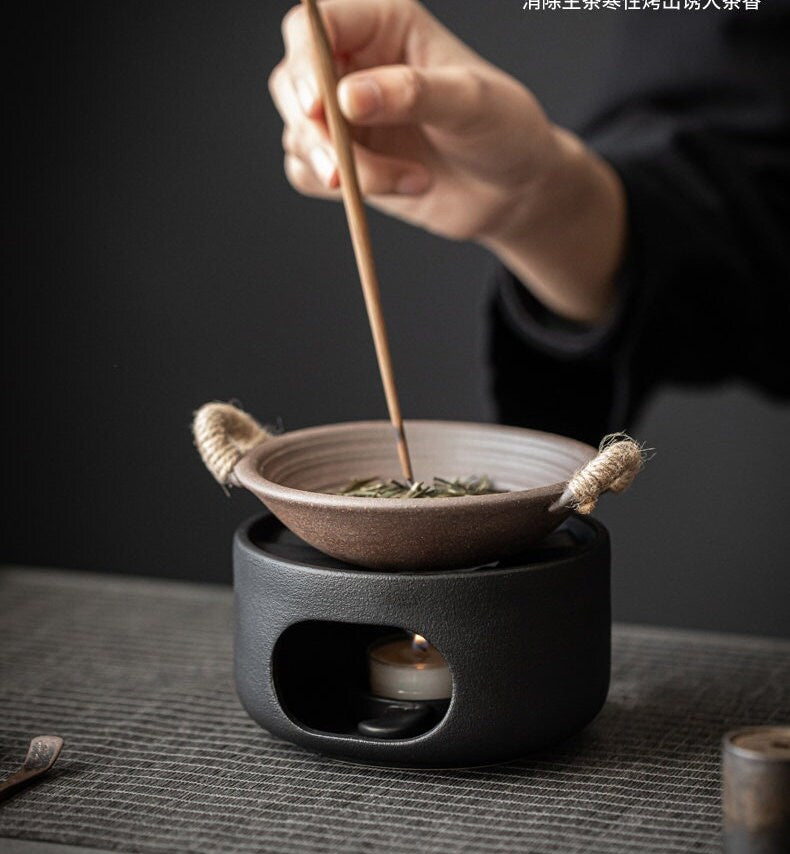 This is a pottery scoop warmer set
