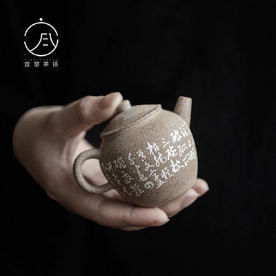 This is a pottery teapot
