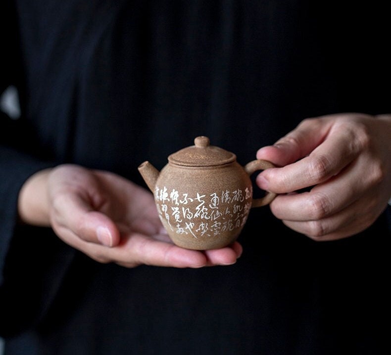 This is a pottery teapot