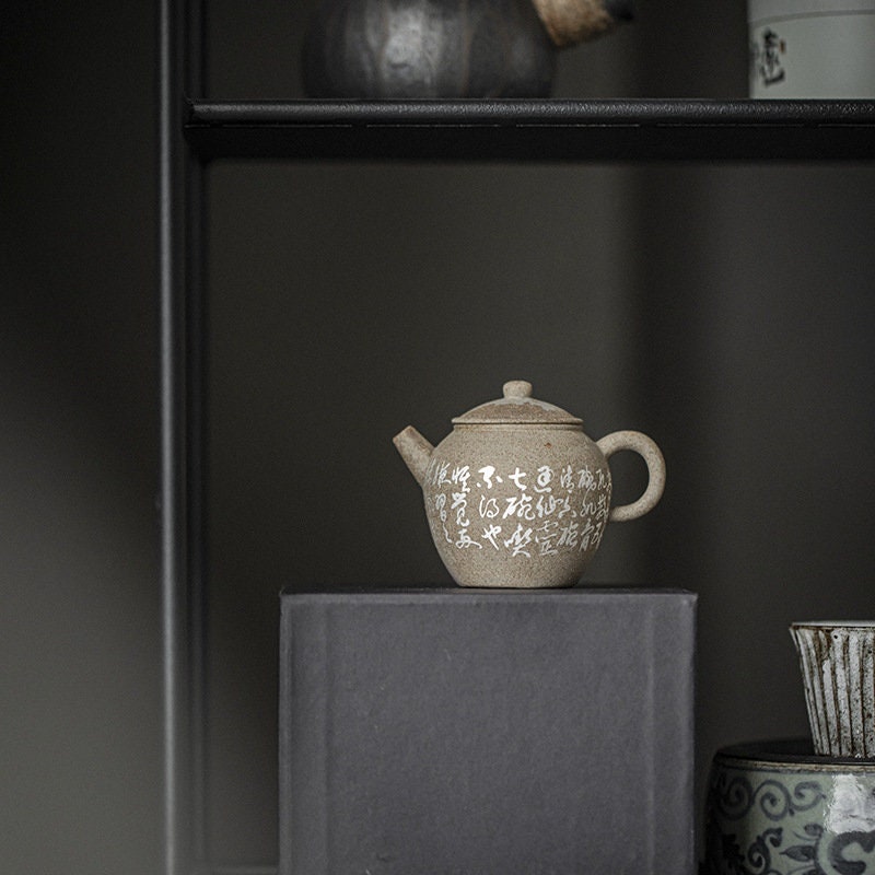 This is a pottery teapot