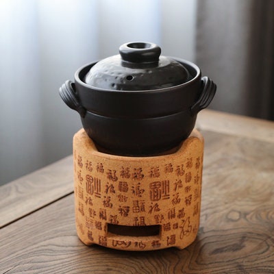 this is a pottery cooking pot