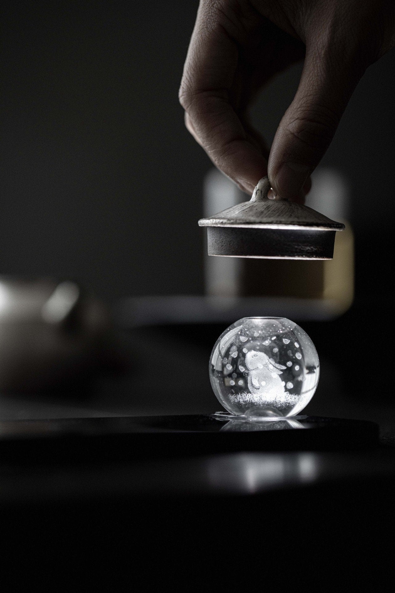 This is a crystal glass lid saucer