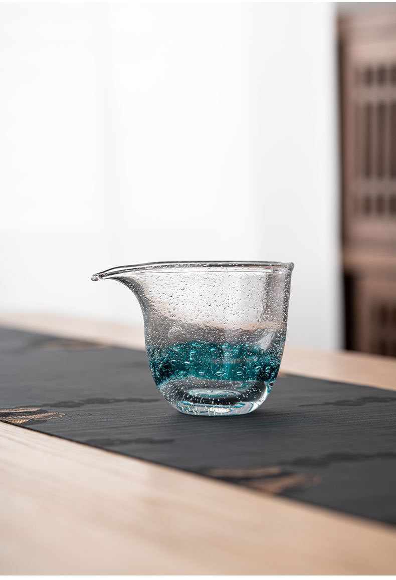 This is a transparent glass faircup gongdaobei