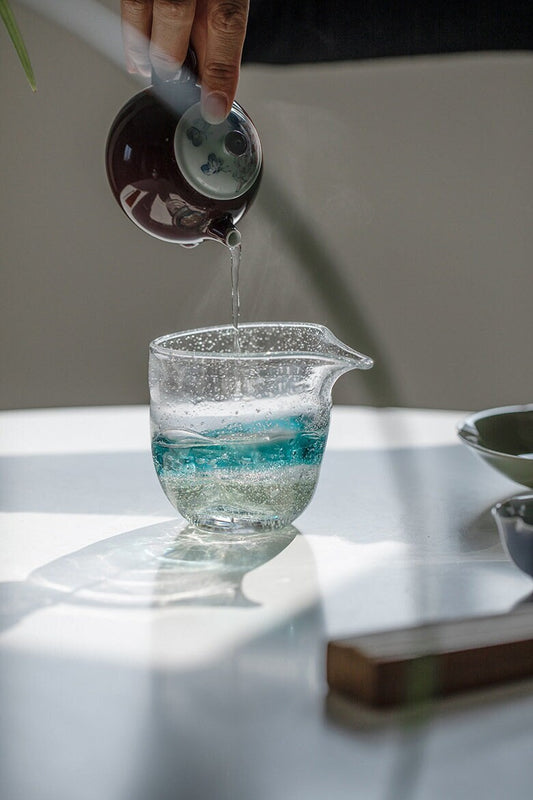 This is a transparent glass faircup gongdaobei