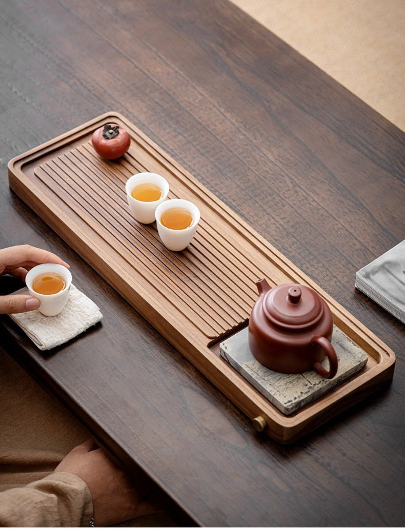 this is a walnut tea tray tea boat