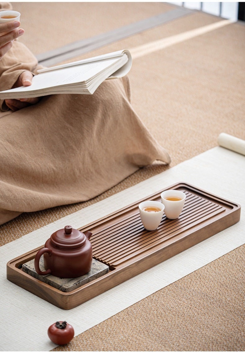 this is a walnut tea tray tea boat