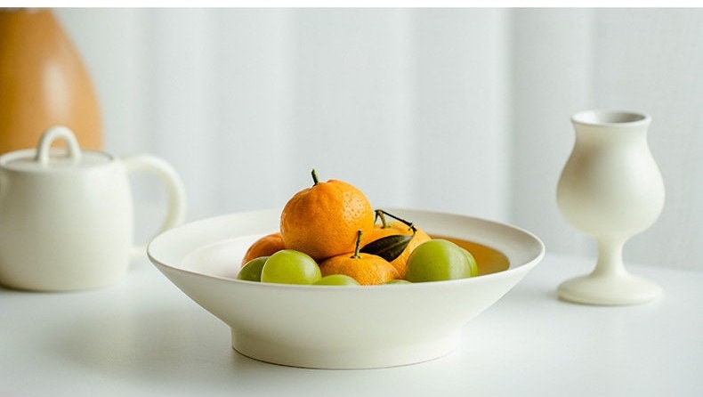 Cream fruit plate simple round foot refreshment tea tray tea boat plate living room decorative ceramic snack plate storage plate