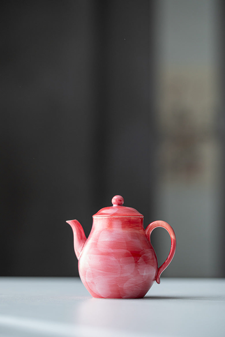 This is a ceramic teapot