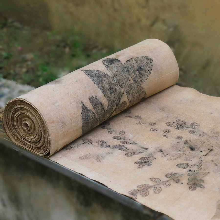 This is a plant-dyed tea mat table cloth