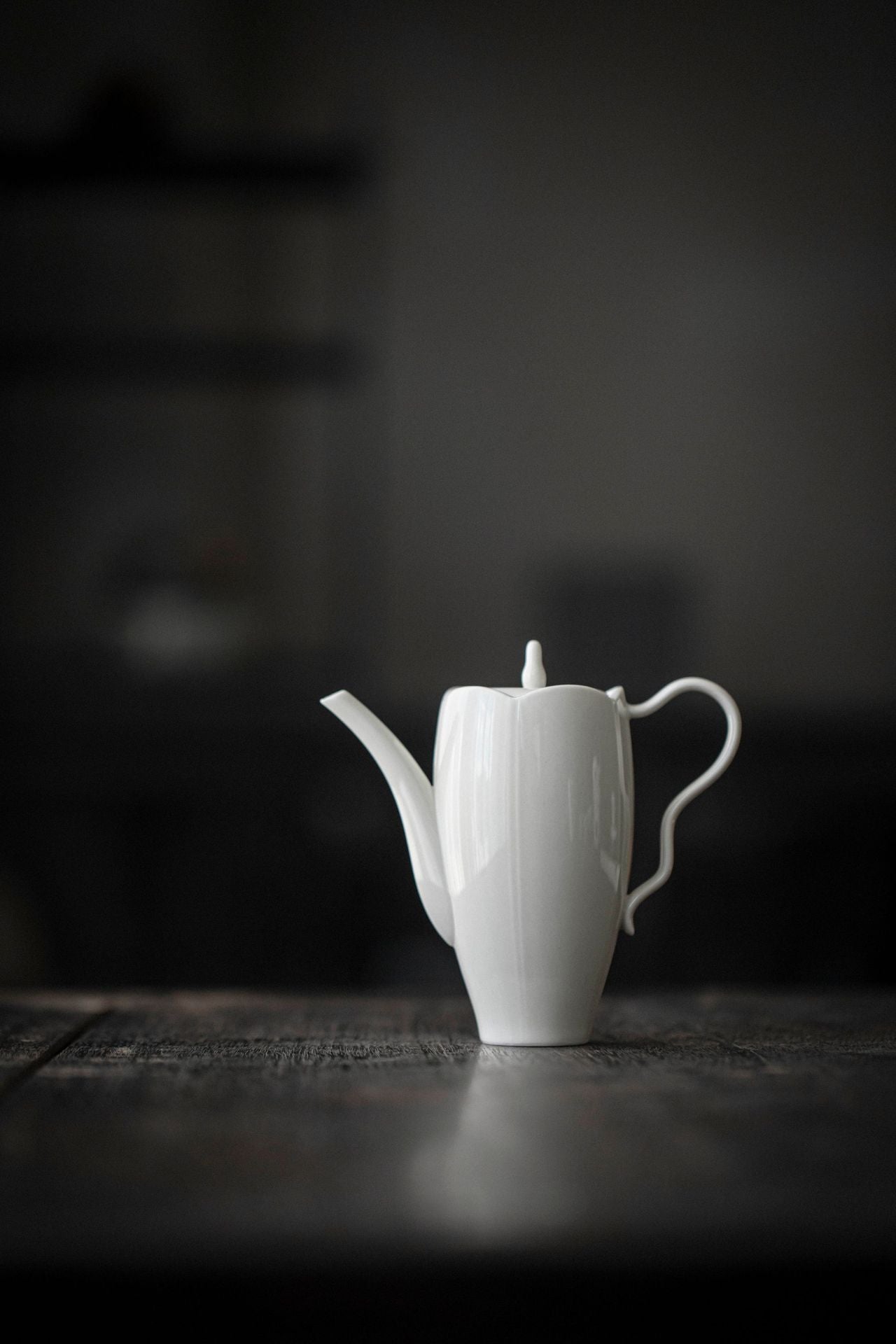 This is a ceramic teapot