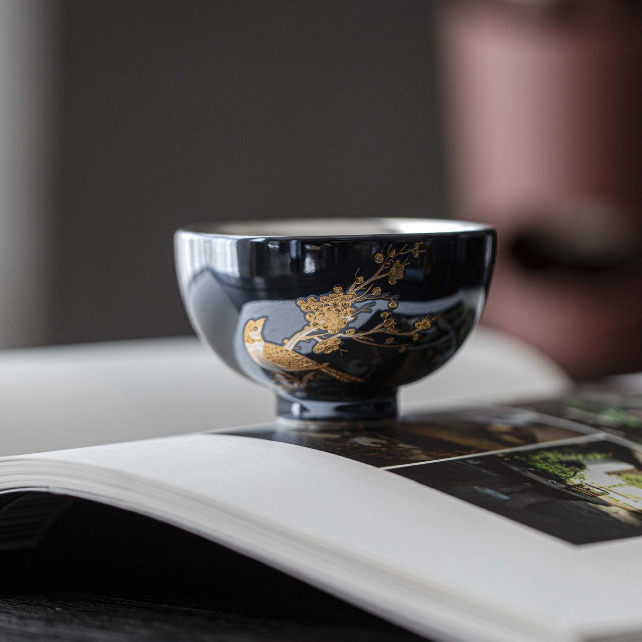 this is a ceramic teapot. this is a gilded silver teapot