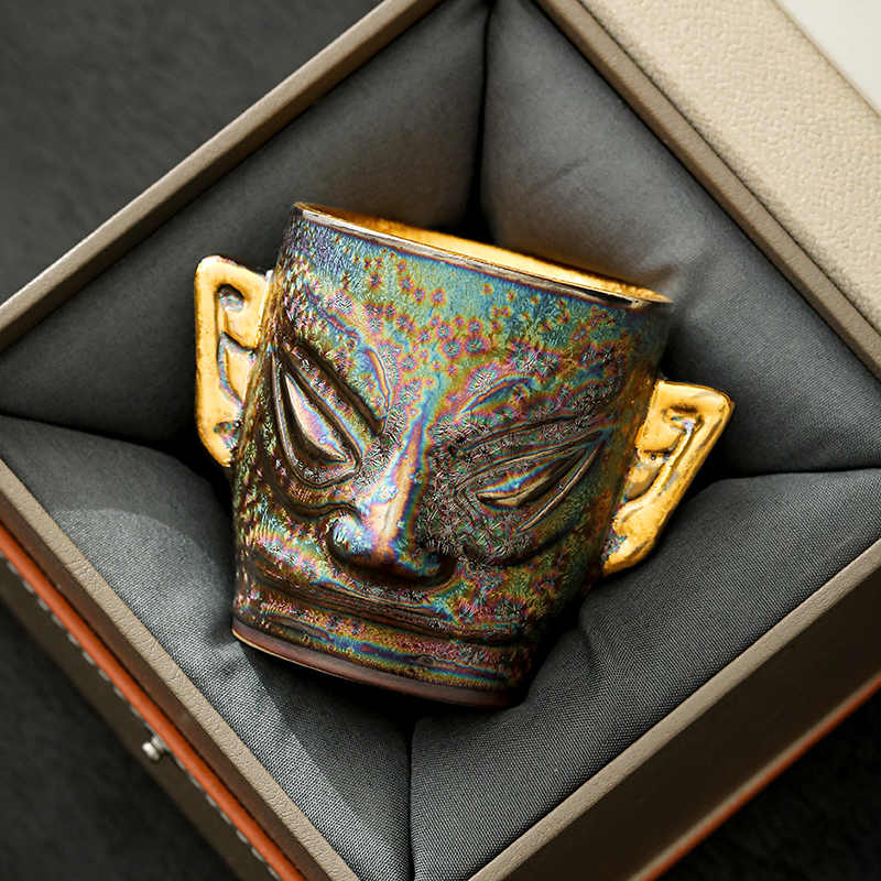 This is a gilded gold Sanxingdui teacup