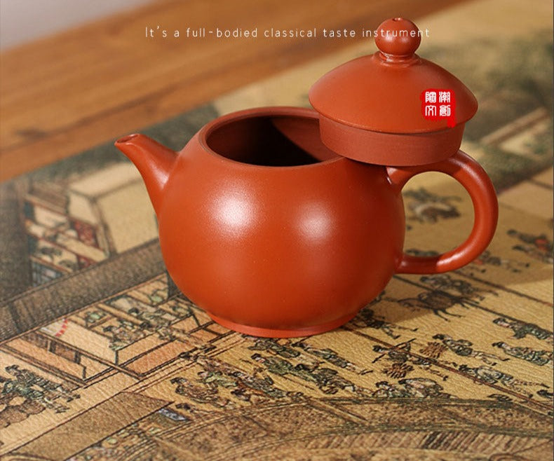 This is a Chaozhou teapot.this is Chaozhou red clay zhuni teapot