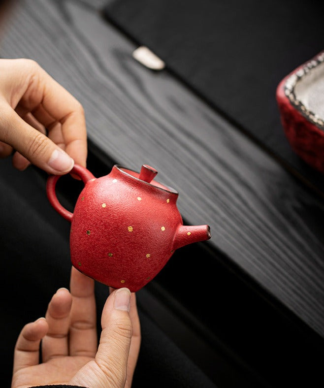 this is a ceramic teapot