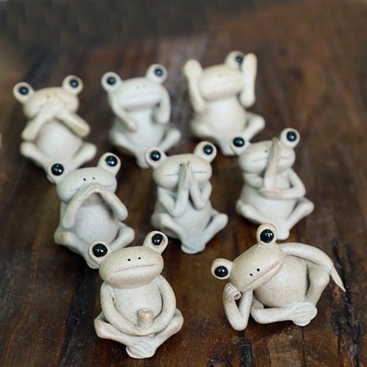 This is a pottery frog teapet