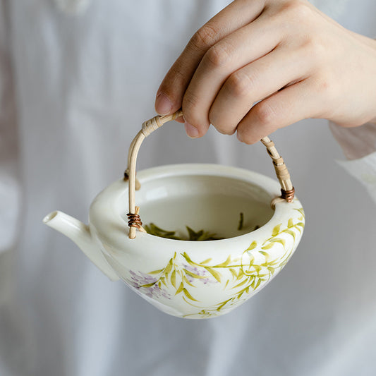 This is a ceramic teapot