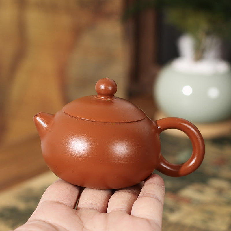 This is a Chaozhou teapot.this is Chaozhou red clay zhuni teapot