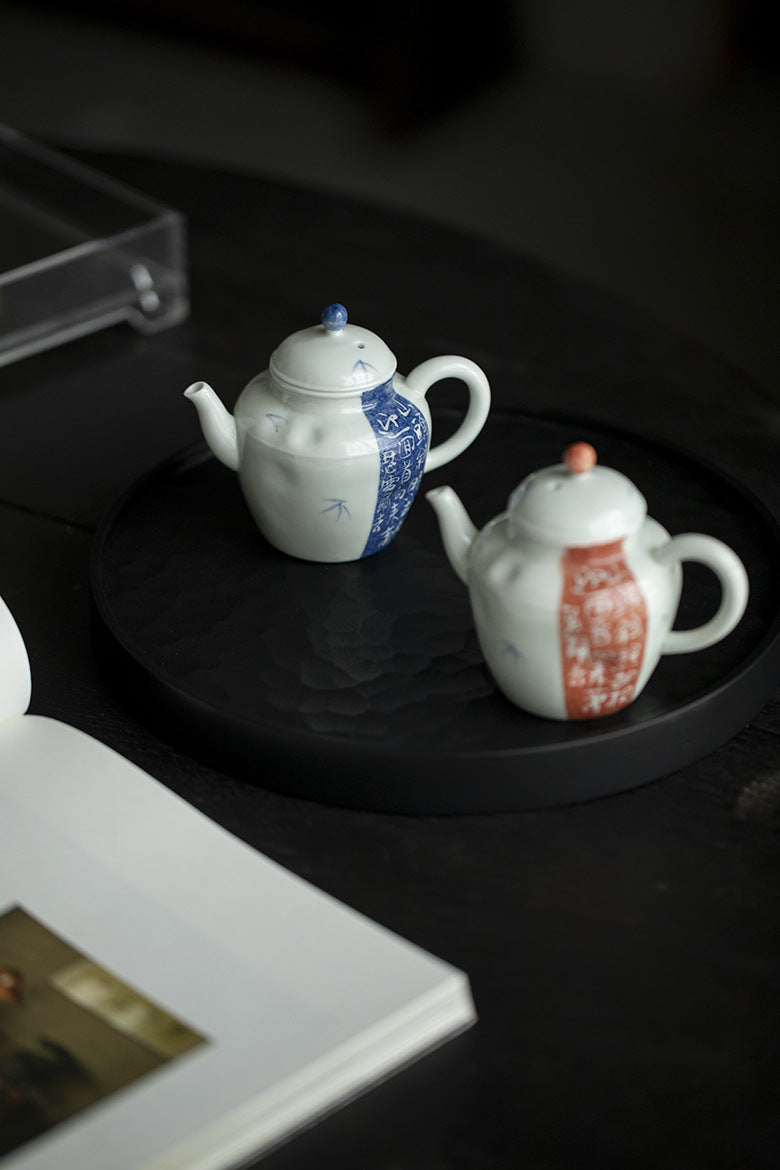 This is a ceramic teapot