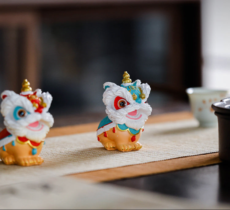 This is Chinese lion dance tea pet. this is a resin tea pet