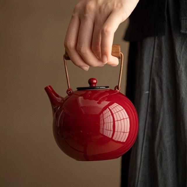 this is Chinese red kettle. this is a pottery kettle stove set